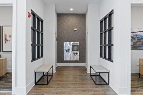 Apartment Rentals in Chattanooga, TN - Leasing-Center-Hallway-with-Seating-and-Drinking-Fountains